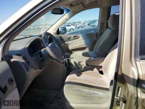 2006 Kia Sedona LX with VIN KNDMB233666035774, listed as a Copart auction lot 65491474 with 106,909 mi miles and Salvage Title. Bid and sale history available at carsss.com. Image 7.