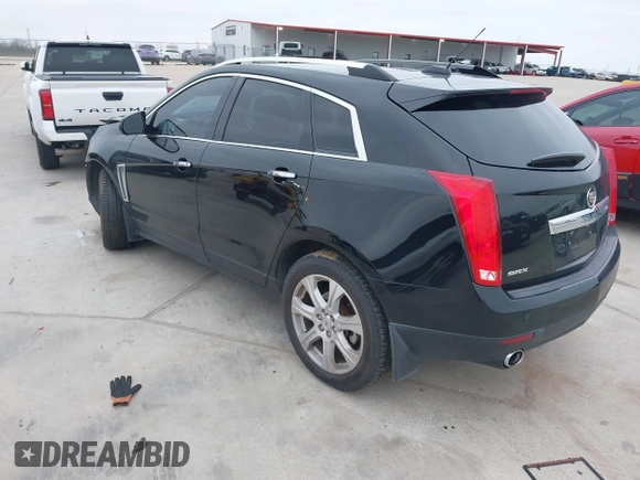 2015 Cadillac SRX Premium Collection z VIN 3GYFNDE3XFS576695, wystawiony jako IAAI lot #41612836 z przebiegiem Nie podano mil oraz . Historia ofert i sprzedaży dostępna na DreamBid. Obrazek 3.