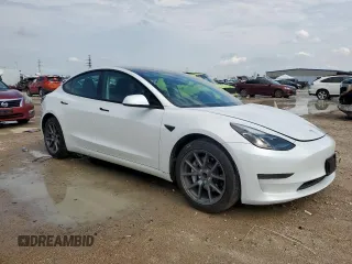 2023 Tesla Model 3 with VIN 5YJ3E1EA1PF550454, listed as a Copart auction lot 58985695 with 19,199 mi miles and Salvage title. Bid and sale history available at DreamBid. Image 4.