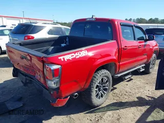 2023 Toyota Tacoma 4WD SR with VIN 3TMCZ5AN1PM613455, listed as a IAAI auction lot 41770990 with 12,643 mi miles. Bid and sale history available at carsss.com. Image 4.