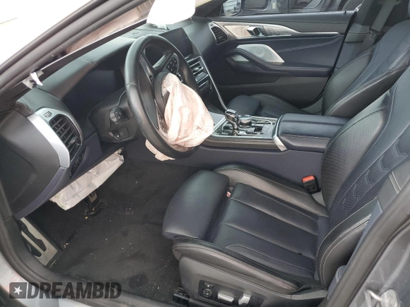 2021 BMW 8 Series M850i with VIN WBAGV8C01MCF75867, listed as a Copart auction lot 62779863 with 24,033 mi miles and . Bid and sale history available at DreamBid. Image 7.