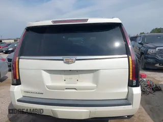 2015 Cadillac Escalade Premium z VIN 1GYS3NKJ1FR553712, wystawiony jako IAAI lot #41660900 z przebiegiem 93 423 mil mil oraz . Historia ofert i sprzedaży dostępna na DreamBid. Obrazek 16.