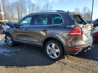 2013 Volkswagen Touareg Sport с VIN WVGEP9BP5DD003924, выставлен на аукционе Copart как лот 83310484 с пробегом Не указан миль и Списание • Salvage title. История ставок и продаж доступна на DreamBid. Изображение 2.