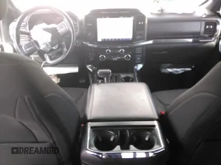 2021 Ford F-150 XL with VIN 1FTFW1E59MFA70313, listed as a Copart auction lot 60793215 with 52,387 mi miles and Salvage title. Bid and sale history available at DreamBid. Image 8.