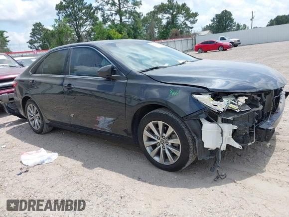 2015 Toyota Camry XLE with VIN 4T1BF1FKXFU881017, listed as a IAAI auction lot 42054825 with 122,232 mi miles and . Bid and sale history available at DreamBid. Image 1.