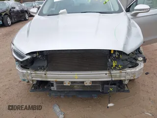 2017 Ford Fusion Titanium with VIN 3FA6P0SU2HR153423, listed as a IAAI auction lot 42029438 with 106,596 mi miles and . Bid and sale history available at DreamBid. Image 18.