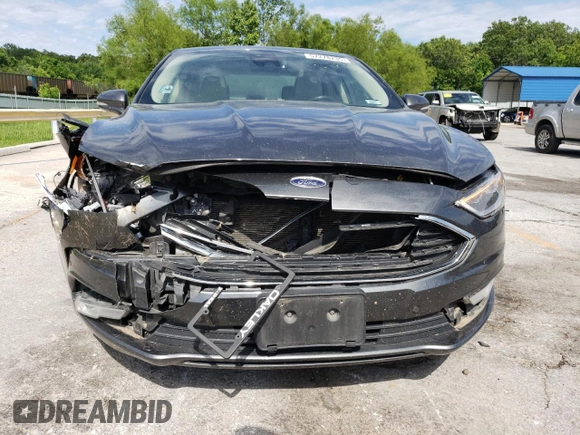 2017 Ford Fusion Titanium with VIN 3FA6P0SU8HR297879, listed as a Copart auction lot 57278235 with 145,923 mi miles and Salvage title. Bid and sale history available at DreamBid. Image 5.