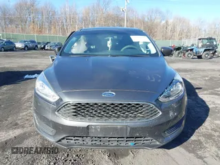 2018 Ford Focus SE z VIN 1FADP3F2XJL295508, wystawiony jako IAAI lot #41608216 z przebiegiem 89 696 mil mil oraz . Historia ofert i sprzedaży dostępna na DreamBid. Obrazek 12.