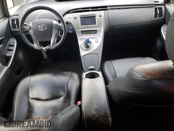 2013 Toyota Prius One z VIN JTDKN3DU8D5586013, wystawiony jako Copart lot #53076285 z przebiegiem 203 087 mil mil oraz Czysty tytuł • Clean title. Historia ofert i sprzedaży dostępna na DreamBid. Obrazek 8.