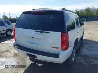 2011 GMC Yukon SLE with VIN 1GKS2AE01BR351651, listed as a IAAI auction lot 41942032 with 337,165 mi miles. Bid and sale history available at carsss.com. Image 4.