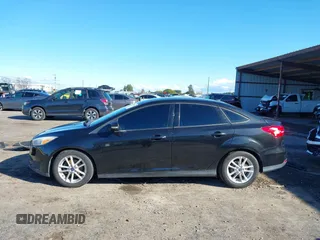 2015 Ford Focus SE with VIN 1FADP3F21FL262033, listed as a IAAI auction lot 41521714 with 101,890 mi miles. Bid and sale history available at carsss.com. Image 14.