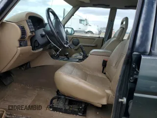 1995 Land Rover Discovery SD z VIN SALJY1241SA139966, wystawiony jako Copart lot #51668315 z przebiegiem 74 615 mil mil oraz Czysty tytuł • Clean title. Historia ofert i sprzedaży dostępna na DreamBid. Obrazek 7.