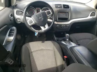 2019 Dodge Journey SE with VIN 3C4PDCBB0KT875474, listed as a Copart auction lot 52987395 with 76,816 mi miles and Salvage Title. Bid and sale history available at DreamBid. Image 8.