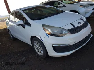 2016 Kia Rio LX with VIN KNADM4A38G6564814, listed as a IAAI auction lot 41789215 with 122,872 mi miles. Bid and sale history available at carsss.com. Image 1.