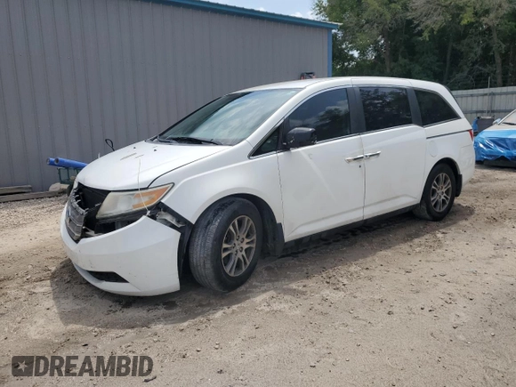 2013 Honda Odyssey EX z VIN 5FNRL5H43DB055987, wystawiony jako Copart lot #54001985 z przebiegiem 162 448 mil mil oraz Szkody całkowita. Historia ofert i sprzedaży dostępna na DreamBid. Obrazek 1.