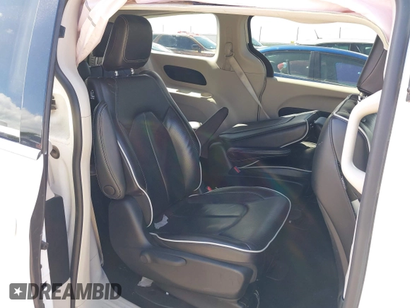 2023 Chrysler Pacifica Hybrid Limited with VIN 2C4RC1S75PR559106, listed as a IAAI auction lot 42613325 with 62,749 mi miles and . Bid and sale history available at DreamBid. Image 8.