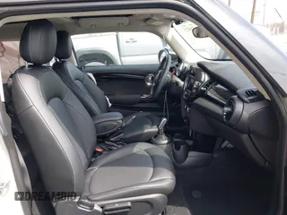 2021 MINI Hardtop Cooper with VIN WMWXR3C09M2N96671, listed as a IAAI auction lot 42031023 with 12,450 mi miles and . Bid and sale history available at DreamBid. Image 5.