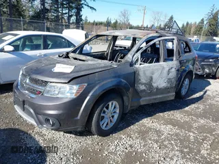 2015 Dodge Journey SXT with VIN 3C4PDDBG3FT755577, listed as a IAAI auction lot 41560150 with Not Provided miles and . Bid and sale history available at DreamBid. Image 2.