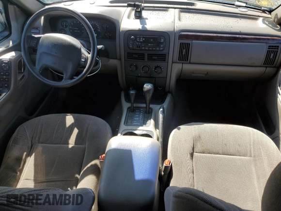 2000 Jeep Grand Cherokee Laredo z VIN 1J4GW48S8YC289367, wystawiony jako Copart lot #51378675 z przebiegiem 176 347 mil mil oraz Szkoda całkowita • Salvage title. Historia ofert i sprzedaży dostępna na DreamBid. Obrazek 8.