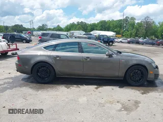 2012 Audi A7 Premium Plus with VIN WAUYGAFC1CN085666, listed as a IAAI auction lot 42177867 with 242,775 mi miles and . Bid and sale history available at DreamBid. Image 13.