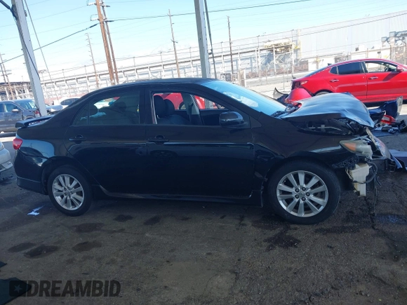 2010 Toyota Corolla with VIN 2T1BU4EE3AC419928, listed as a IAAI auction lot 41976564 with 143,075 mi miles. Bid and sale history available at carsss.com. Image 13.