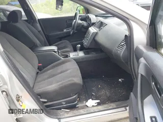 2003 Nissan Murano SE z VIN JN8AZ08W43W214000, wystawiony jako IAAI lot #42274384 z przebiegiem 98 927 mil mil oraz . Historia ofert i sprzedaży dostępna na DreamBid. Obrazek 5.