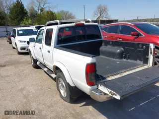 2000 Nissan Frontier 2WD XE with VIN 1N6ED27T0YC387758, listed as a IAAI auction lot 41981132 with 247,214 mi miles. Bid and sale history available at carsss.com. Image 3.