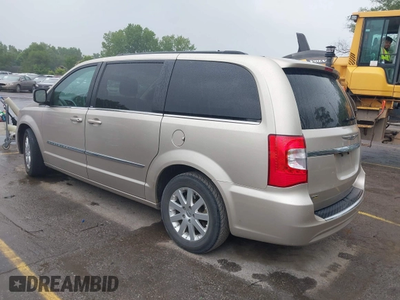2014 Chrysler Town & Country Touring with VIN 2C4RC1BG7ER208937, listed as a IAAI auction lot 42213347 with 198,077 mi miles and . Bid and sale history available at DreamBid. Image 3.
