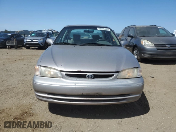 1998 Toyota Corolla VE with VIN 1NXBR18E6WZ080700, listed as a Copart auction lot 58605135 with 214,928 mi miles and Salvage title. Bid and sale history available at DreamBid. Image 5.