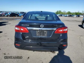 2018 Nissan Sentra S with VIN 3N1AB7AP4JY348669, listed as a Copart auction lot 55848195 with 50,700 mi miles and Salvage Title. Bid and sale history available at DreamBid. Image 6.