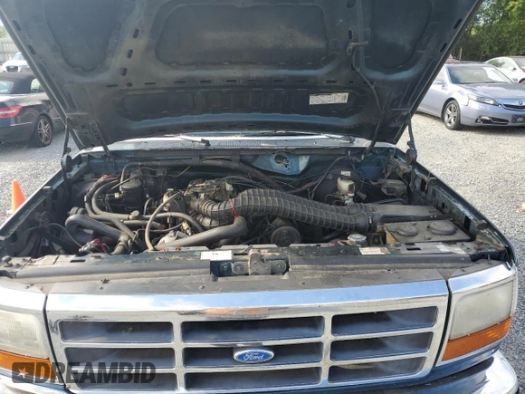 1994 Ford F-150 with VIN 1FTEX14H1RKB75298, listed as a Copart auction lot 64775735 with 227,601 mi miles and Clean title. Bid and sale history available at DreamBid. Image 11.