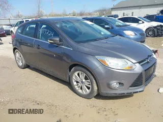 2012 Ford Focus SEL with VIN 1FAHP3M23CL460208, listed as a IAAI auction lot 41893224 with 146,553 mi miles. Bid and sale history available at carsss.com. Image 1.