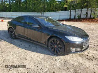 2014 Tesla Model S 60 z VIN 5YJSA1H10EFP40472, wystawiony jako Copart lot #55942595 z przebiegiem 104 241 mil mil oraz Czysty tytuł • Clean title. Historia ofert i sprzedaży dostępna na DreamBid. Obrazek 4.