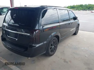 2014 Chrysler Town & Country Touring with VIN 2C4RC1BG8ER296073, listed as a IAAI auction lot 42164103 with 129,006 mi miles and . Bid and sale history available at DreamBid. Image 4.