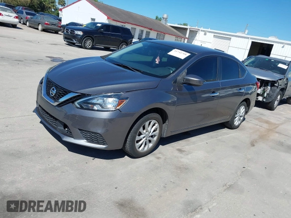 2019 Nissan Sentra SV z VIN 3N1AB7AP5KY310563, wystawiony jako IAAI lot #41742708 z przebiegiem 60 275 mil mil oraz . Historia ofert i sprzedaży dostępna na DreamBid. Obrazek 2.