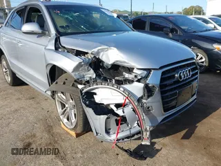 2017 Audi Q3 Premium Plus z VIN WA1JCCFSXHR000319, wystawiony jako IAAI lot #41986889 z przebiegiem 74 675 mil mil oraz . Historia ofert i sprzedaży dostępna na DreamBid. Obrazek 6.