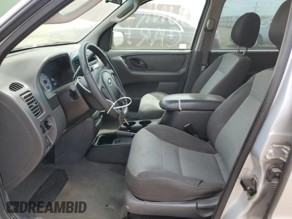 2004 Ford Escape XLS с VIN 1FMYU02134KA88982, выставлен на аукционе Copart как лот 57037915 с пробегом 195 423 миль миль и Списание • Salvage title. История ставок и продаж доступна на DreamBid. Изображение 7.