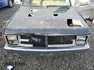 1988 Dodge Dakota z VIN 1B7GN14X5JS776983, wystawiony jako Copart lot #76597944 z przebiegiem 133 654 mil mil oraz Czysty tytuł • Clean title. Historia ofert i sprzedaży dostępna na DreamBid. Obrazek 11.