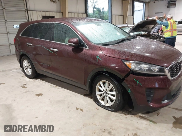 2019 Kia Sorento L with VIN 5XYPG4A34KG548624, listed as a IAAI auction lot 42020831 with 124,226 mi miles. Bid and sale history available at carsss.com. Image 1.