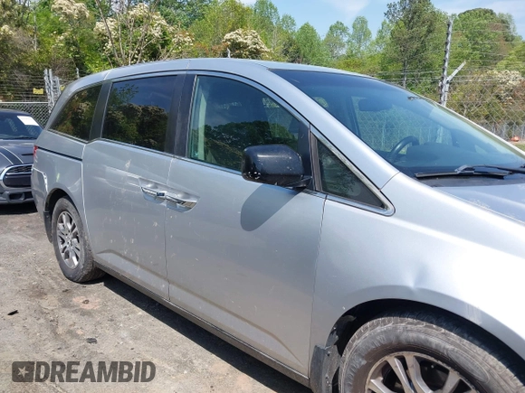 2011 Honda Odyssey EX-L with VIN 5FNRL5H62BB075789, listed as a IAAI auction lot 42035746 with 238,616 mi miles and . Bid and sale history available at carsss.com. Image 13.