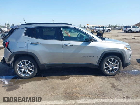 2022 Jeep Compass Latitude Lux with VIN 3C4NJDFB9NT170662, listed as a IAAI auction lot 42500321 with 57,782 mi miles and . Bid and sale history available at DreamBid. Image 14.