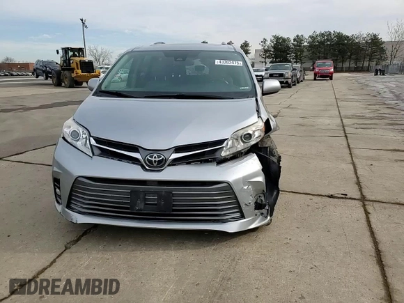 2018 Toyota Sienna XLE z VIN 5TDDZ3DC1JS197031, wystawiony jako Copart lot #44201715 z przebiegiem 180 475 mil mil oraz Szkoda całkowita • Salvage title. Historia ofert i sprzedaży dostępna na DreamBid. Obrazek 11.