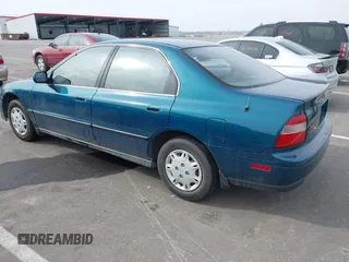 1995 Honda Accord LX with VIN JHMCD5635SC053096, listed as a IAAI auction lot 41666918 with 166,745 mi miles and . Bid and sale history available at carsss.com. Image 3.