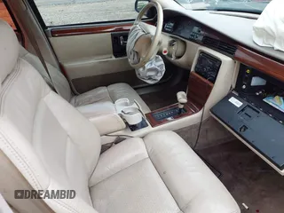 1994 Cadillac Seville STS z VIN 1G6KY5296RU823387, wystawiony jako IAAI lot #42151901 z przebiegiem 165 918 mil mil oraz . Historia ofert i sprzedaży dostępna na DreamBid. Obrazek 5.