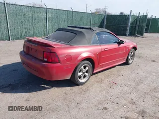 2001 Ford Mustang Deluxe with VIN 1FAFP44491F242798, listed as a IAAI auction lot 41779856 with 166,017 mi miles. Bid and sale history available at carsss.com. Image 4.
