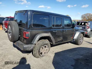 2023 Jeep Wrangler Sport with VIN 1C4HJXDN9PW512460, listed as a Copart auction lot 77107894 with 23,142 mi miles and Salvage Title. Bid and sale history available at DreamBid. Image 3.