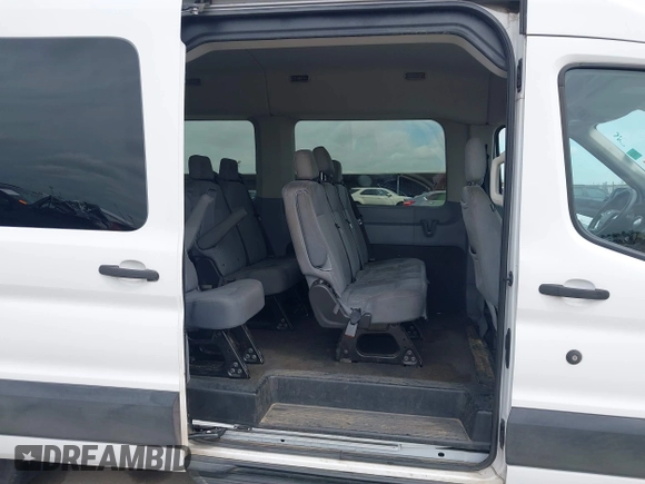 2019 Ford Transit Passenger XL with VIN 1FBAX2CM5KKA36711, listed as a IAAI auction lot 41660414 with 205,719 mi miles and . Bid and sale history available at DreamBid. Image 8.