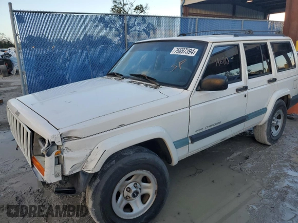 1999 Jeep Cherokee Sport with VIN 1J4FT68S6XL578679, listed as a Copart auction lot 76697394 with 196,110 mi miles and Salvage title. Bid and sale history available at DreamBid. Image 1.