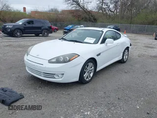 2008 Hyundai Tiburon GS z VIN KMHHM66D58U283273, wystawiony jako IAAI lot #41900097 z przebiegiem 154 013 mil mil oraz . Historia ofert i sprzedaży dostępna na DreamBid. Obrazek 20.