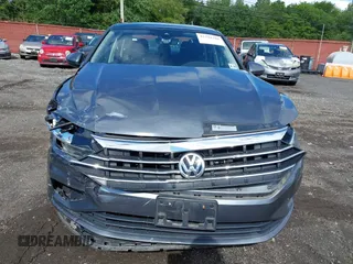 2020 Volkswagen Jetta SEL z VIN 3VWEB7BU2LM024016, wystawiony jako IAAI lot #42341318 z przebiegiem 40 480 mil mil oraz . Historia ofert i sprzedaży dostępna na DreamBid. Obrazek 12.